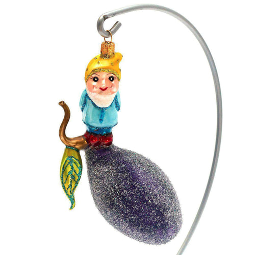 john derian Gnome on Plum Ornament Add to cart All Holiday ornaments and items are final sale and are not eligible for return or exchange.  With its whimsical details this eccentric gnome perched on a plum ornament brings a spr