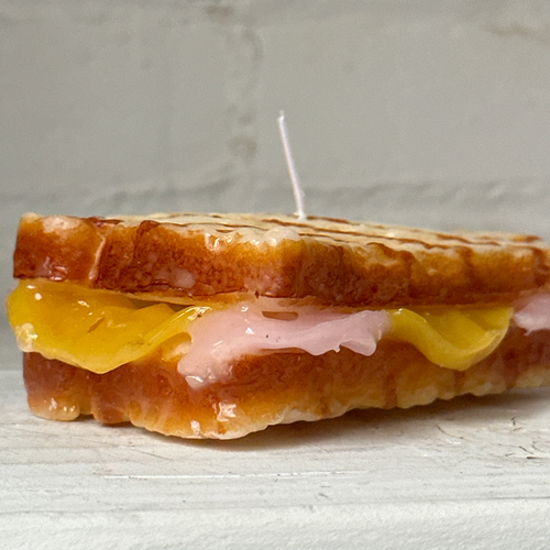 John Derian Ham & Cheese Panini Sandwich Candle Add To Cart Details 4.75" W X 1.5" H Paraffin Wax Each Item Will Feature Unique Variations Made In Italy Care Remove All Paper Before Burning. Not Intended For Children. Cereria In