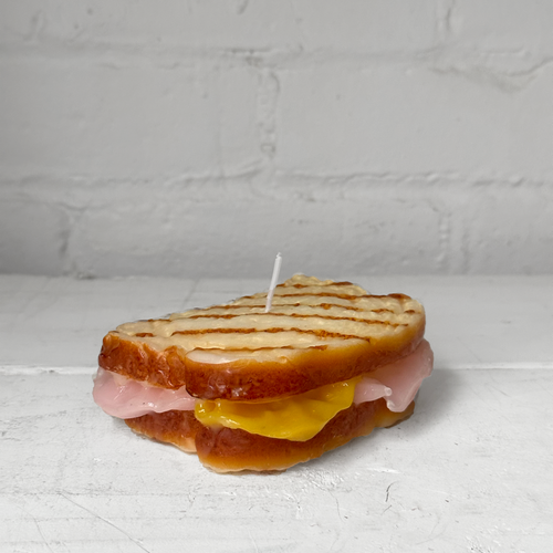 john derian Ham & Cheese Panini Sandwich Candle Add to cart Details 4.75" W x 1.5" H Paraffin Wax Each item will feature unique variations Made in Italy Care Remove All Paper Before Burning. Not intended for children. Cereria In