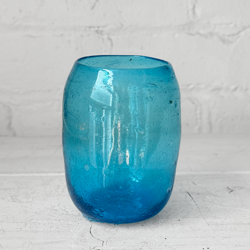john derian Herati Glass Tumbler in Turquoise Add to cart Details Handblown Each item will feature unique variations. Made in Afganastan Tunisia and Turkey Please note that because this item is handmade the dimensions will vary