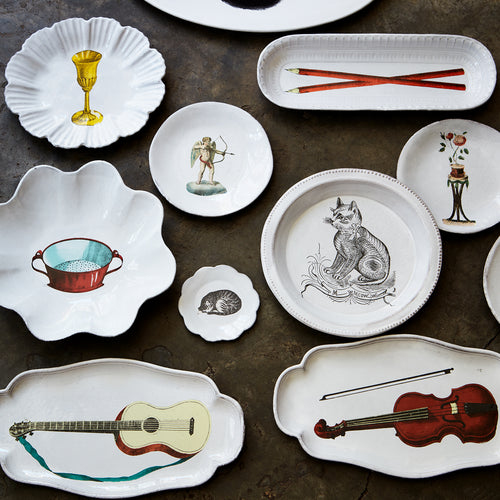 John Derian John Derian Guitar Platter Add To Cart Details 10.75" L X 6" W X .5" Deep Glazed Terracotta Made In Paris Care Dishwasher Safe On A Moderate Wash Cycle. Not Microwave Safe. Image Origin "The Instructive Picture Book