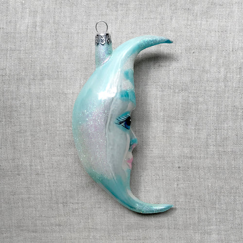 John Derian Light Blue & White Moon Ornament Add To Cart All Holiday Ornaments And Items Are Final Sale And Are Not Eligible For Return Or Exchange.  Details 3" W X 5.5" H Glass Handblown in Poland Please Note All Ornaments A