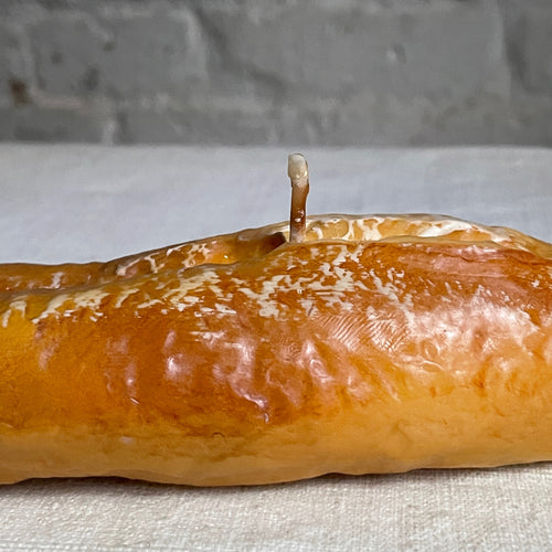 John Derian Long Panne Baguette Candle Add To Cart Details 13" L X 2" W x 1" H Paraffin Wax Each Item Will Feature Unique Variations Made In Italy Care Remove All Paper Before Burning. Not Intended For Children.   Cereria Int