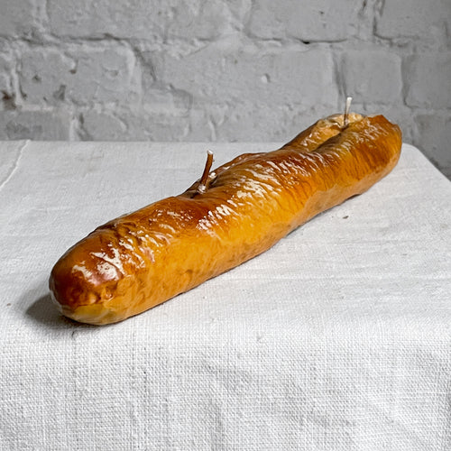 john derian Long Panne Baguette Candle Add to cart Details 13" L x 2" W x 1" H Paraffin Wax Each item will feature unique variations Made in Italy Care Remove All Paper Before Burning. Not intended for children.   Cereria Int