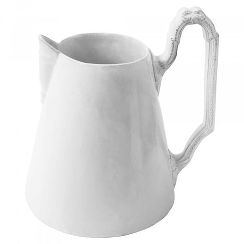john derian Louis XV Large Pitcher Add to cart Pichet 9.8" Length x 8.3" Width x 10.6" Height Black Terra Cotta with White Enameled Glaze Each item will feature unique variations Made in Paris Care Dishwasher safe on a moderate