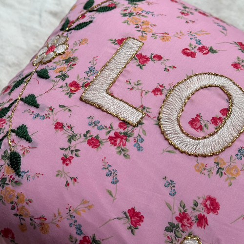 John Derian "Love" Embroidered Cushion (CS 09-02) Add To Cart The "Love" Embroidered Pillow By CSAO Features A Charming Floral Print Motif Hand-embroidered Lettering And Flowers Showcasing West African Craftsmanship. Notably Eac