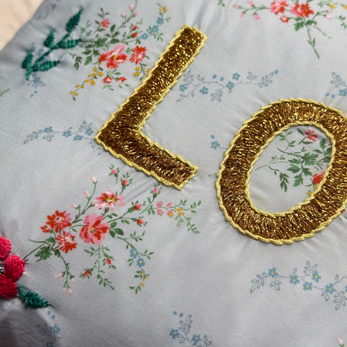 John Derian "Love" Embroidered Cushion (CS 09-04) Add To Cart The "Love" Embroidered Pillow By CSAO Features A Charming Floral Print Motif Hand-embroidered Lettering And Flowers Showcasing West African Craftsmanship. Notably Eac