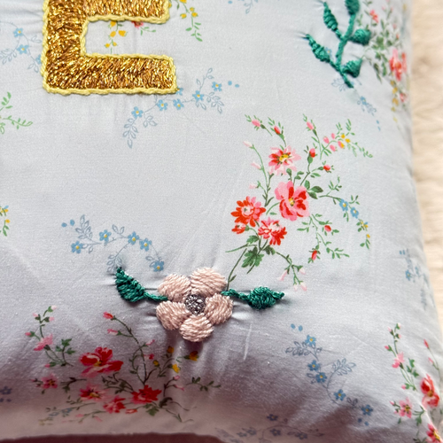 John Derian "Love" Embroidered Cushion (CS 09-04) Add To Cart The "Love" Embroidered Pillow By CSAO Features A Charming Floral Print Motif Hand-embroidered Lettering And Flowers Showcasing West African Craftsmanship. Notably Eac