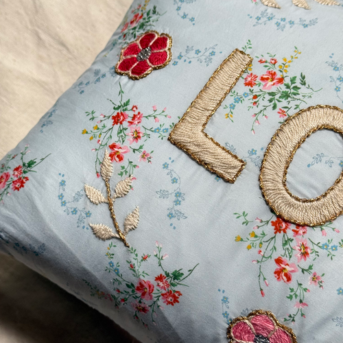 John Derian "Love" Embroidered Cushion (CS 09-09) Add To Cart The "Love" Embroidered Pillow By CSAO Features A Charming Floral Print Motif Hand-embroidered Lettering And Flowers Showcasing West African Craftsmanship. Notably Eac