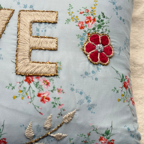 John Derian "Love" Embroidered Cushion (CS 09-09) Add To Cart The "Love" Embroidered Pillow By CSAO Features A Charming Floral Print Motif Hand-embroidered Lettering And Flowers Showcasing West African Craftsmanship. Notably Eac