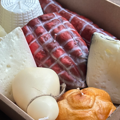 John Derian Meat & Cheese 8 Piece Candle Set Add To Cart Details 8 Pieces Included: Fetta Formaggio Red & Black Cheese Slices Pane Rosetta Roll Candle Scamorza Round Cow's Milk Cheese Selame Formaggio Graviera Cheese And Capocol