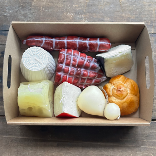 John Derian Meat & Cheese 8 Piece Candle Set Add To Cart Details 8 Pieces Included: Fetta Formaggio Red & Black Cheese Slices Pane Rosetta Roll Candle Scamorza Round Cow's Milk Cheese Selame Formaggio Graviera Cheese And Capocol