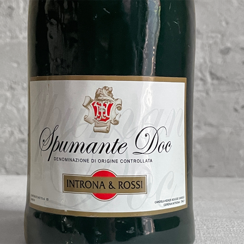 John Derian Medium Spumante Sparkling Wine Bottle Candle Add To Cart Details  11" H Paraffin Wax Each Item Will Feature Unique Variations Made In Italy Care Remove All Paper Before Burning. Not Intended For Children.   Cereria