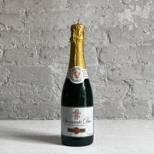 john derian Medium Spumante Sparkling Wine Bottle Candle Add to cart Details  11" H Paraffin Wax Each item will feature unique variations Made in Italy Care Remove All Paper Before Burning. Not intended for children.   Cereria