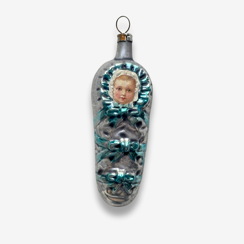 john derian Nostalgic Baby in Blue Ornament Add to cart All Holiday ornaments and items are final sale and are not eligible for return or exchange.  This vintage inspired bundled pink baby ornament is a nostalgic addition to yo