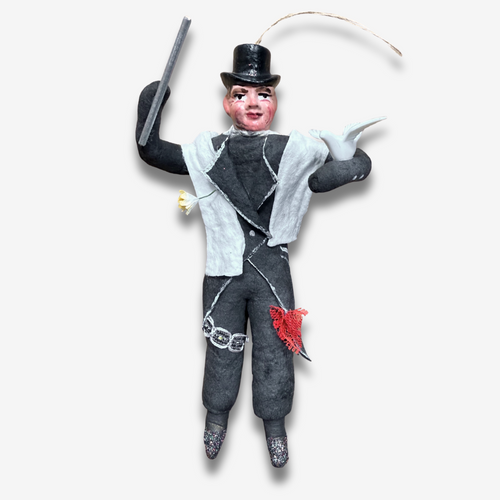john derian Nostalgic Cotton Magician with Porcelain Head Ornament Add to cart This nostalgic magician ornament features a delicate hand-painted porcelain head. Dressed in a soft cotton attire with shimmering details he holds a