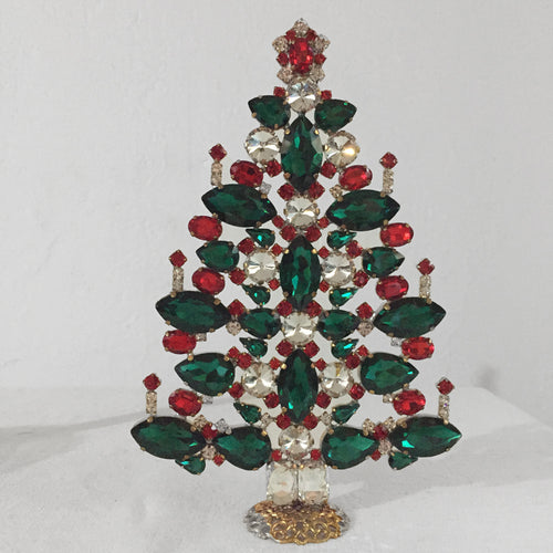 john derian Nostalgic Glass Jeweled Tree in Red & Green Add to cart All Holiday ornaments and items are final sale and are not eligible for return or exchange. Details 5.5" W x 8.25" H Glass jewels with gilded metal base Handm