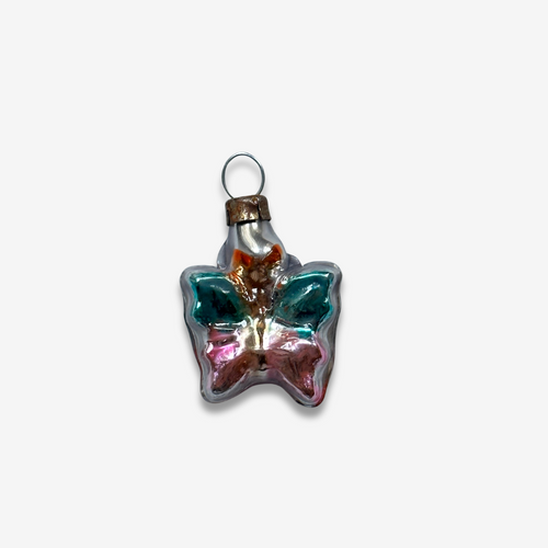 john derian Nostalgic Mini Butterfly Ornament Add to cart All Holiday ornaments and items are final sale and are not eligible for return or exchange.  Details 1" W x 1.5" H Glass Mouth blown in Laucha Germany Item embraces v