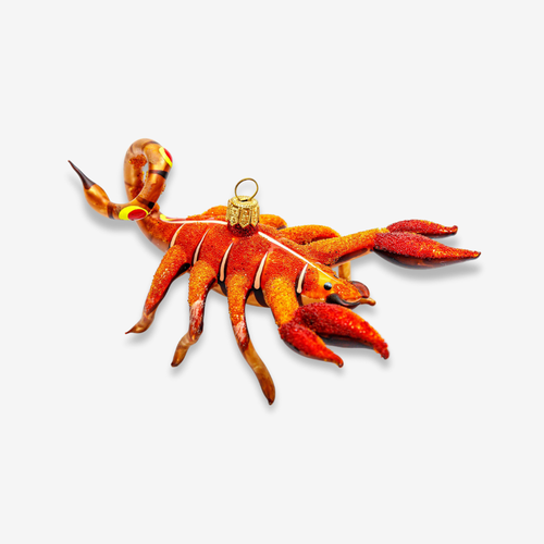 john derian Orange Scorpion Ornament Add to cart All Holiday ornaments and items are final sale and are not eligible for return or exchange.  This orange scorpion ornament is a striking piece that combines vibrant colors with a