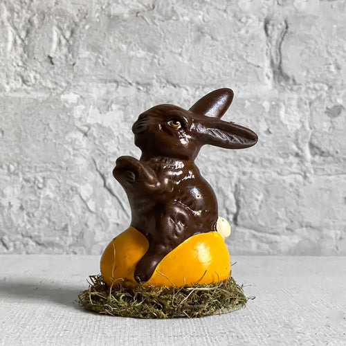 john derian Papier Mâché Bunny on Egg Add to cart Details 2.5" x 3" W x 4" H Painted papier-mâché  and moss Each item will feature unique variations Handmade in Germany   Based in Germany and family owned since 1894 Ino S