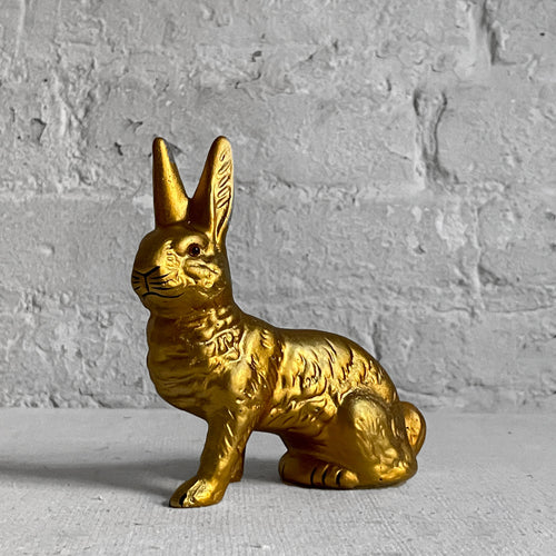 john derian Papier Mâché Seated Gold Bunny Add to cart Details 5" L 2" W x 5" H Painted papier-mâché with glass eye Each item will feature unique variations Handmade in Germany   Based in Germany and family owned since 18