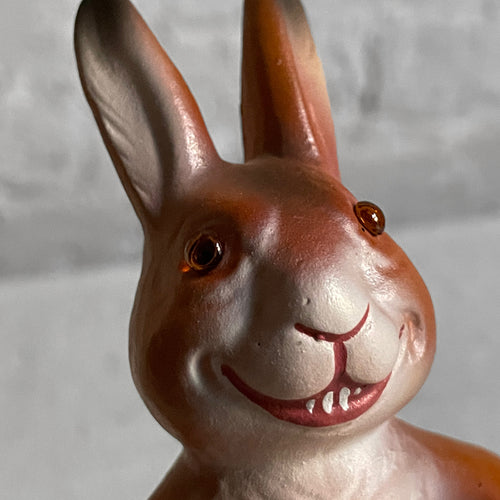 John Derian Papier Mâché Upright Bunny With Green Basket Add To Cart Details 3.5" W X 6" H Painted Papier-mâché Glitter And Straw Each Item Will Feature Unique Variations Handmade in Germany   Based In Germany And Family O