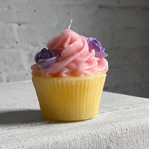John Derian Pink Frosting With Light Purple Flowers Cupcake Candle Add To Cart Details 2.5" W X 3" H Paraffin Wax Each Item Will Feature Unique Variations Made In Italy Care Remove All Paper Before Burning. Not Intended For Chil