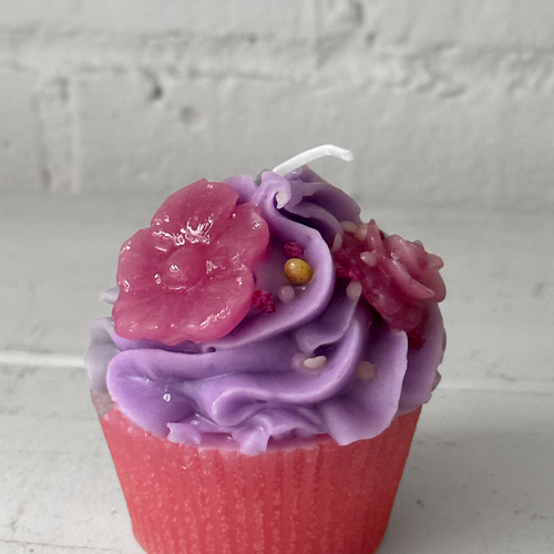 John Derian Purple Frosting With Light Purple Flowers Cupcake Candle Add To Cart Details 2.5" W X 3" H Paraffin Wax Each Item Will Feature Unique Variations Made In Italy Care Remove All Paper Before Burning. Not Intended For Ch
