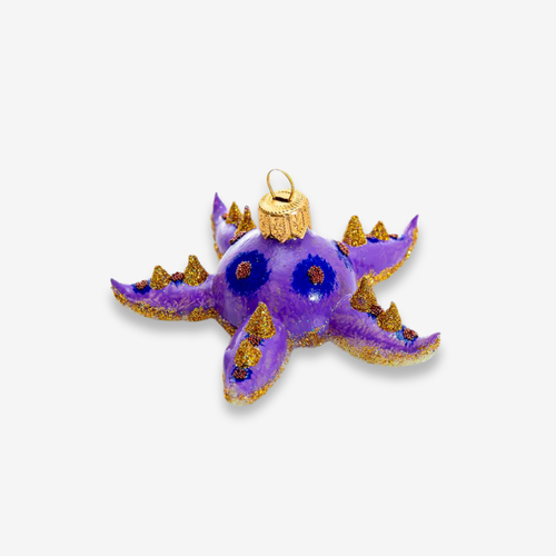 john derian Purple Starfish Ornament Add to cart All Holiday ornaments and items are final sale and are not eligible for return or exchange.  Catch of the day Add a touch of the nautical charm to your holiday décor with this P