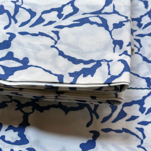 John Derian Rasa Block Printed Sheet Set In White Shadow & Lapis Twin Set - $325.00 Queen Set - $430.00 King Set - $480.00 Set Of 2 Standard Pillowcases - $75.00 Set Of 2 King Pillowcases - $80.00