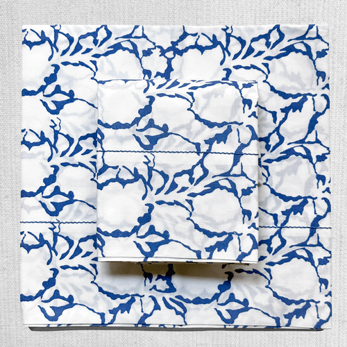 john derian Rasa Block Printed Sheet Set in White Shadow & Lapis Twin Set - $325.00 Queen Set - $430.00 King Set - $480.00 Set of 2 Standard Pillowcases - $75.00 Set of 2 King Pillowcases - $80.00