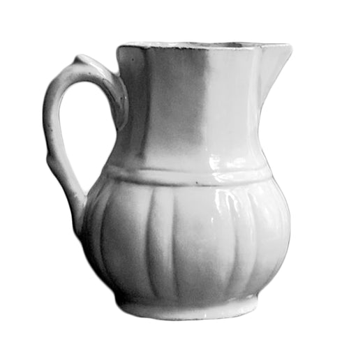john derian Régence Pitcher Add to cart Pichet 6.1" Wide x 3.6" Diameter x 6.5" Height Black Terra Cotta with White Enameled Glaze Each item will feature unique variations Made in Paris Care Dishwasher safe on a moderate wash