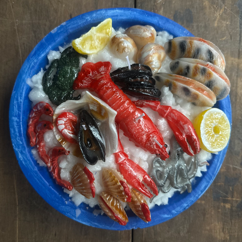 John Derian Seafood Platter Candle Add To Cart Details 11.5" W X 4" H Paraffin Wax Each Item Will Feature Unique Variations Made In Italy Care Remove All Paper Before Burning. Not Intended For Children. Cereria Introna Has Been