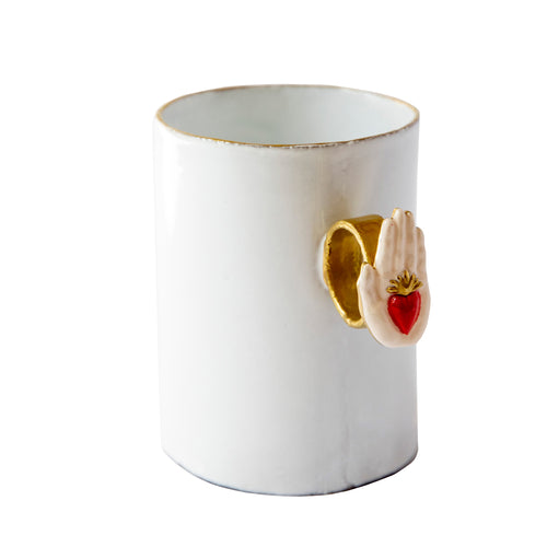 john derian Serena Carone Heart on Hand Ring Cup Add to cart Tasse Details 4.1" x 2.9" x 3.9" Black Terra Cotta with White Enameled Glaze Each item will feature unique variations Made in Paris Care Dishwasher safe on a moderate