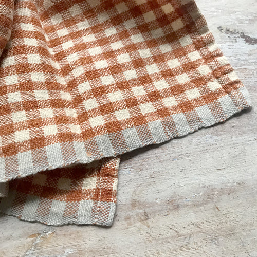 John Derian Set Of 4 Gingham Napkins In Cognac & Blue Add To Cart Set Of 4 Two-Toned Napkins Details 20" X 20" 100% Hand-Spun Linen Made In India Care Machine Wash Cold Gentle Cycle Tumble Dry. Do Not Bleach.   Caravan A Celeb