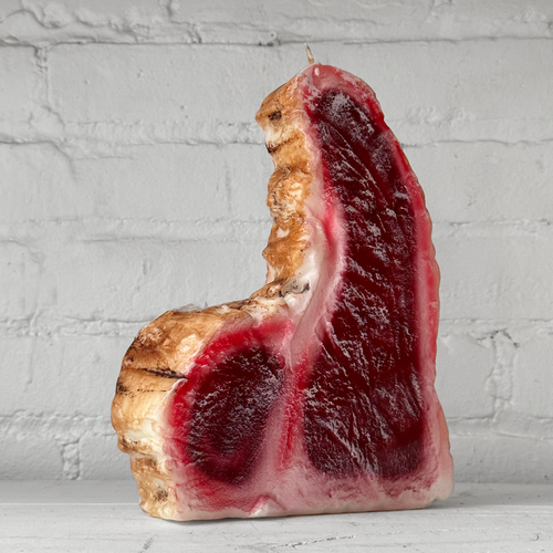 john derian Steak Candle Add to cart Details 7" L x 2.5" W x 9.75" H Paraffin Wax Each item will feature unique variations Made in Italy Care Remove All Paper Before Burning. Not intended for children.   Cereria Introna has bee