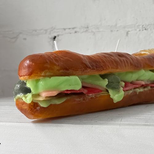 John Derian Stuffed Baguette Sandwich Candle Add To Cart Details 13" L X 2.5" W X 2.25" H Paraffin Wax Each Item Will Feature Unique Variations Made In Italy Care Remove All Paper Before Burning. Not Intended For Children. Cerer
