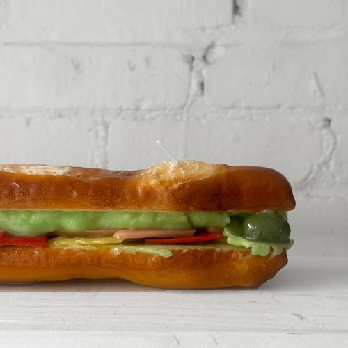 John Derian Stuffed Baguette Sandwich Candle Add To Cart Details 13" L X 2.5" W X 2.25" H Paraffin Wax Each Item Will Feature Unique Variations Made In Italy Care Remove All Paper Before Burning. Not Intended For Children. Cerer