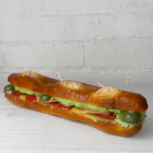john derian Stuffed Baguette Sandwich Candle Add to cart Details 13" L x 2.5" W x 2.25" H Paraffin Wax Each item will feature unique variations Made in Italy Care Remove All Paper Before Burning. Not intended for children. Cerer