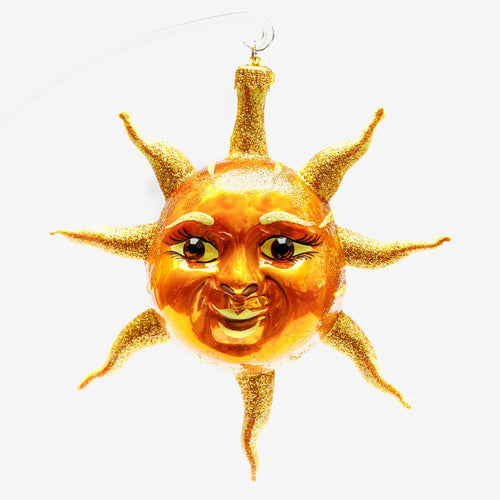 john derian Sun Face w beaded Eyes Ornament Add to cart All Holiday ornaments and items are final sale and are not eligible for return or exchange.  Details 6" W x 6" H Glass Handblown in Poland Please note all ornaments and
