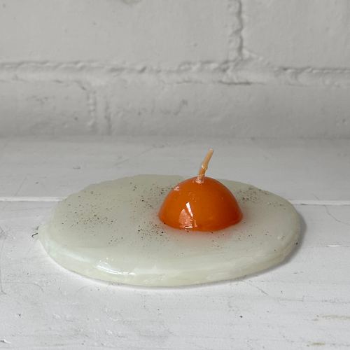 john derian Uovo Fried Egg Candle Add to cart Details 5.5" L x .75" H Paraffin Wax Each item will feature unique variations Made in Italy Care Remove All Paper Before Burning. Not intended for children.   Cereria Introna has b