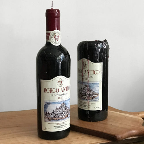 john derian Vino Primitivo Rosso Red Wine Bottle Candle Add to cart Details 12" H Paraffin Wax Each item will feature unique variations Made in Italy Care Remove All Paper Before Burning. Not intended for children. Cereria Intr