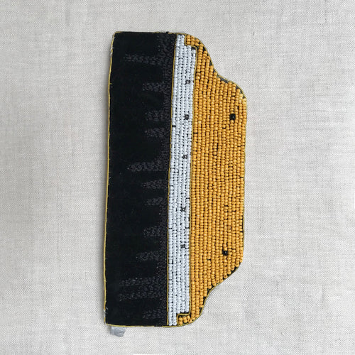 john derian Wide Brush Craftsman Pouch Add to cart Details  7.2" W x 3.3 H Each item will feature unique variations Handmade from recycled materials   Rooted in their principle notion of sustainability and simplicity Puebco