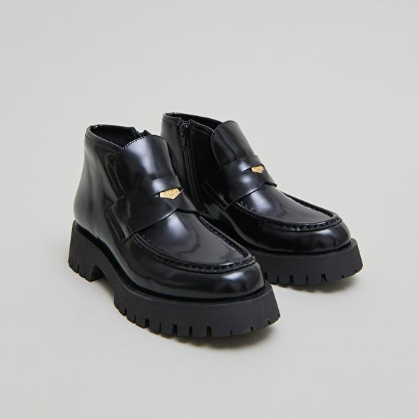 jonak Boots à empiècements in black glazed leather DESK