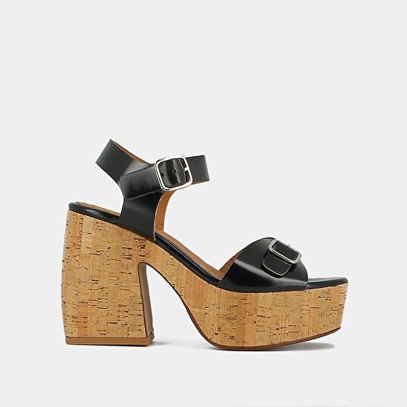 jonak Buckle and platform sandals in black glazed leather MATHILDE