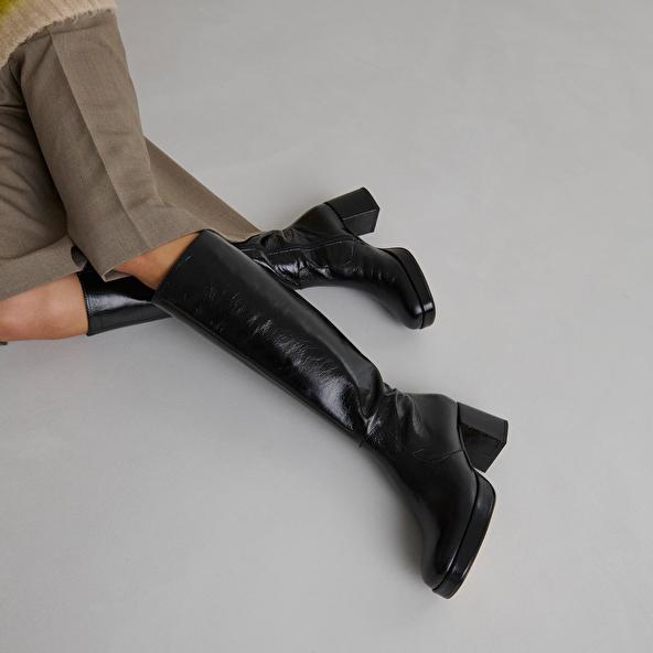 jonak Heeled platform boots in black distressed leather VANEO