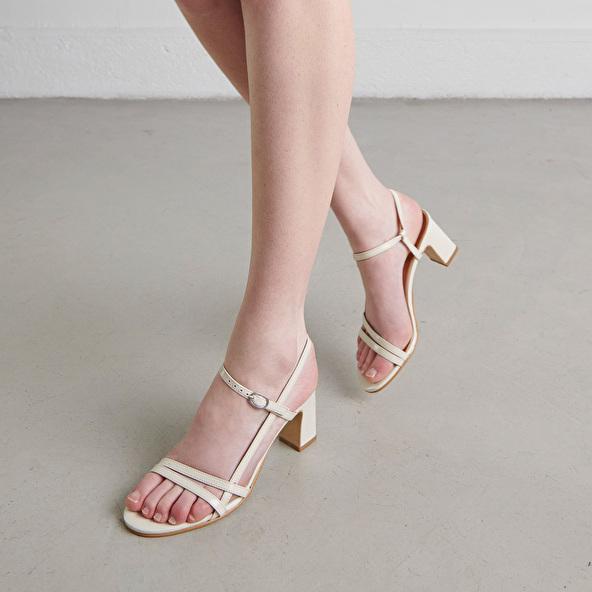 jonak Sandals with heels and straps in ecru shiny leather VICOMTE