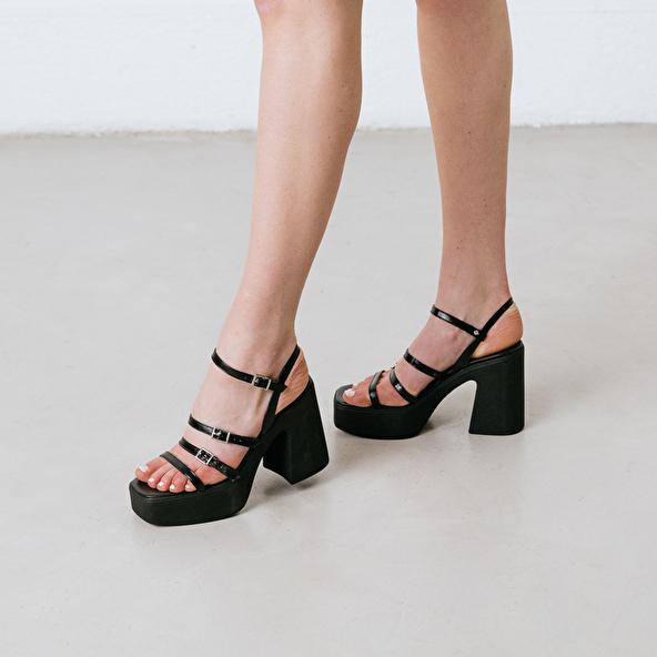 jonak Sandals with straps and platforms in black pleated patent PUZZLE