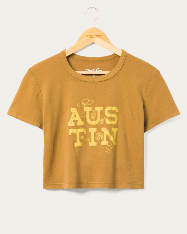 junk food clothing Women's Austin Texas Baby Tee Toasted Coconut
