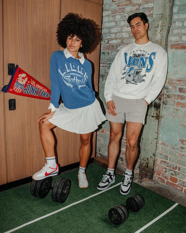 Junk Food Clothing Women's Detroit Lions Football Raglan Crew Fleece Lions Blue